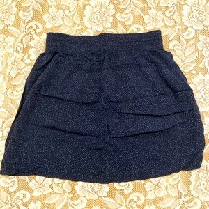 Navy blue polka dotted skirt